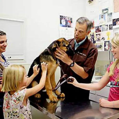 CHECKUP WITH A DOG AND FAMILY